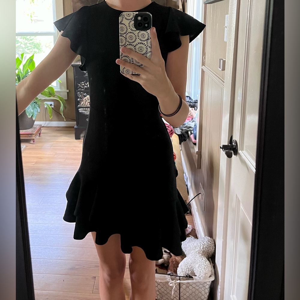 Black ruffled dress perfect condition brand new size XS